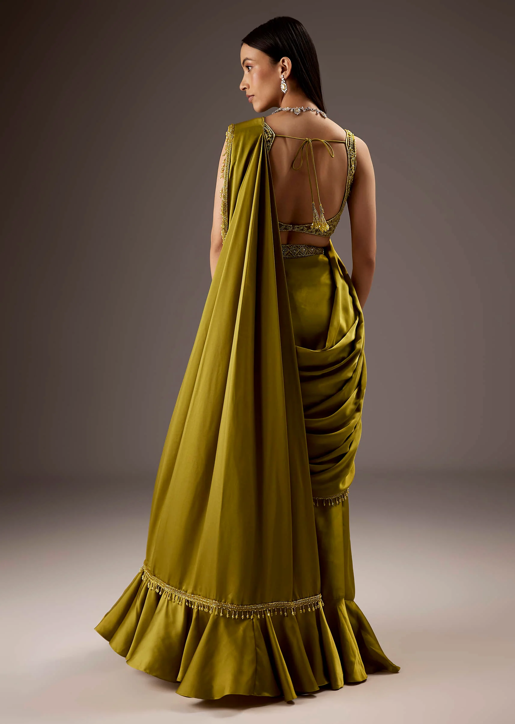 Green Silk Saree With Elegant Bead Work And Frills - Image 2