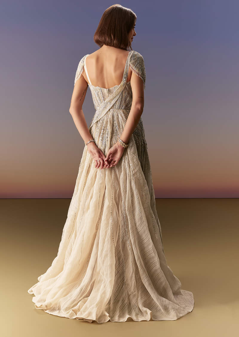 Grey Gown With Draped Cap Sleeves And Flowing Embroidered Flare - Image 2