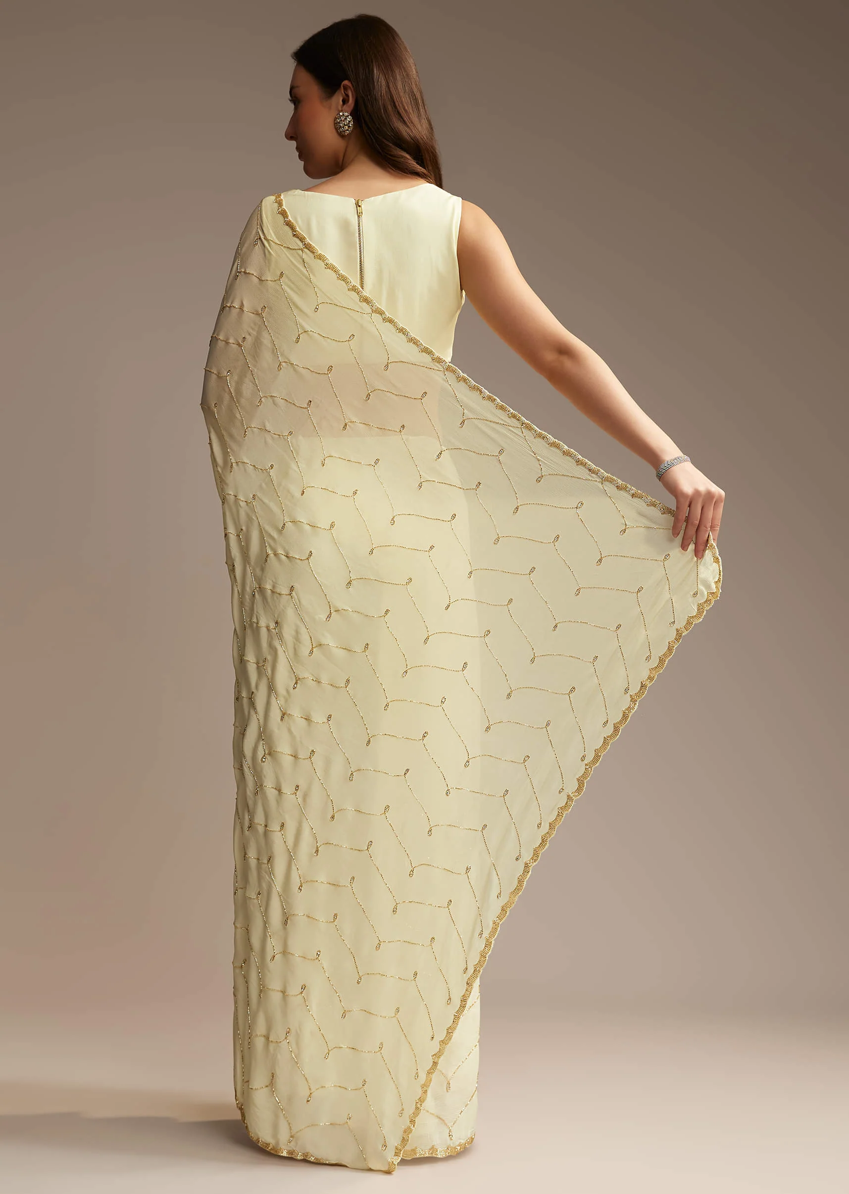 Off White Chinon Saree with Cutdana and Stone Work - Image 5