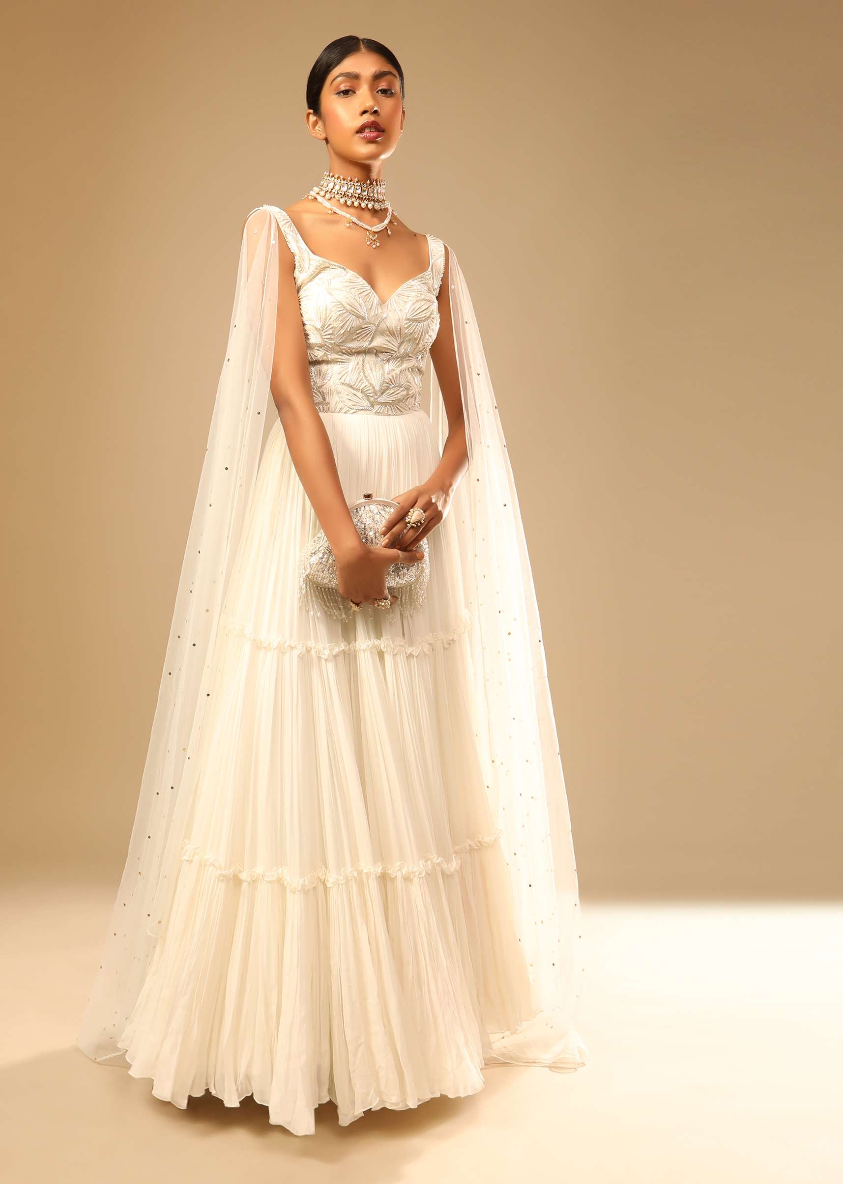 Off White Gown In Georgette With Tiered Flare And Hand Embroidered Leaf Motifs On The Bodice - Image 5