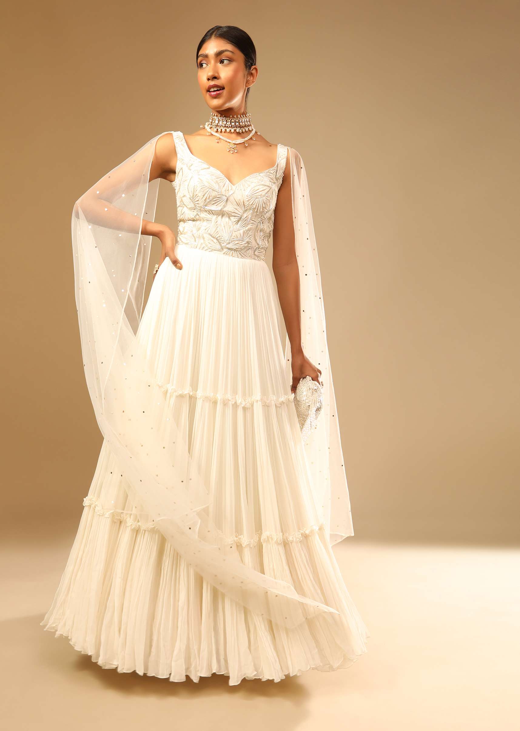 Off White Gown In Georgette With Tiered Flare And Hand Embroidered Leaf Motifs On The Bodice - Image 7