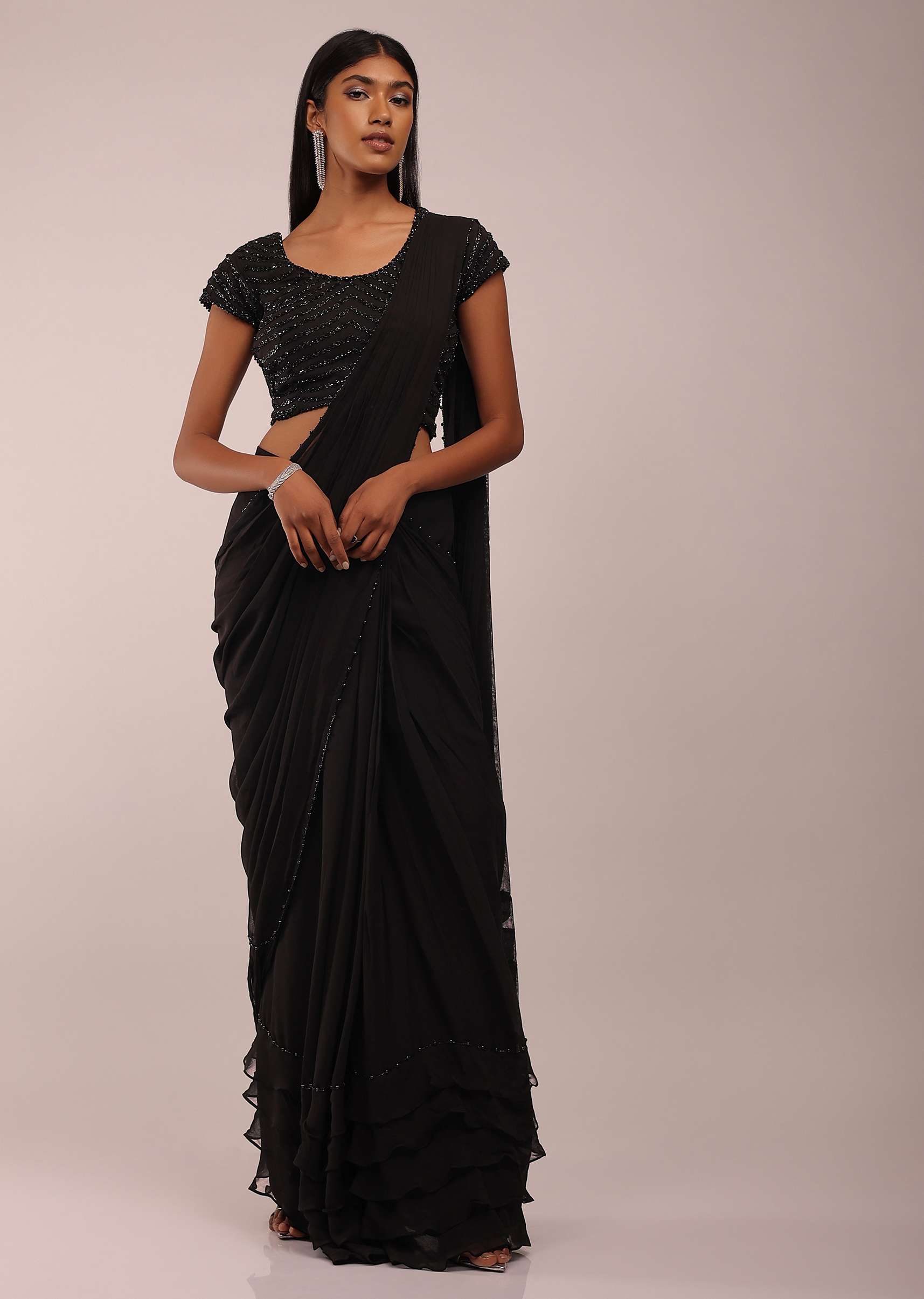 Pitch Black Saree With Three Tones Of Layered Frills On The Bottom Embellished In Stones And Sequins With A Tassel On The Pallu Corner - Image 3