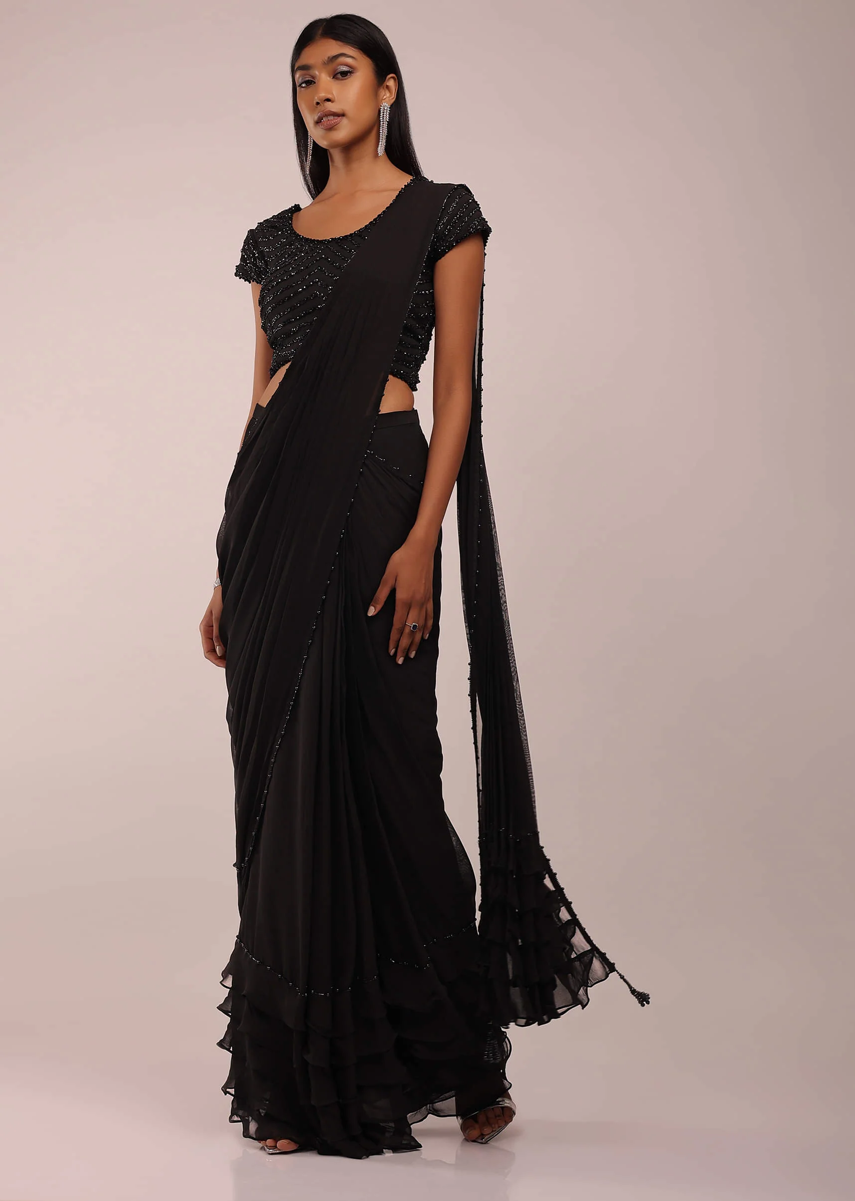 Pitch Black Saree With Three Tones Of Layered Frills On The Bottom Embellished In Stones And Sequins With A Tassel On The Pallu Corner - Image 8