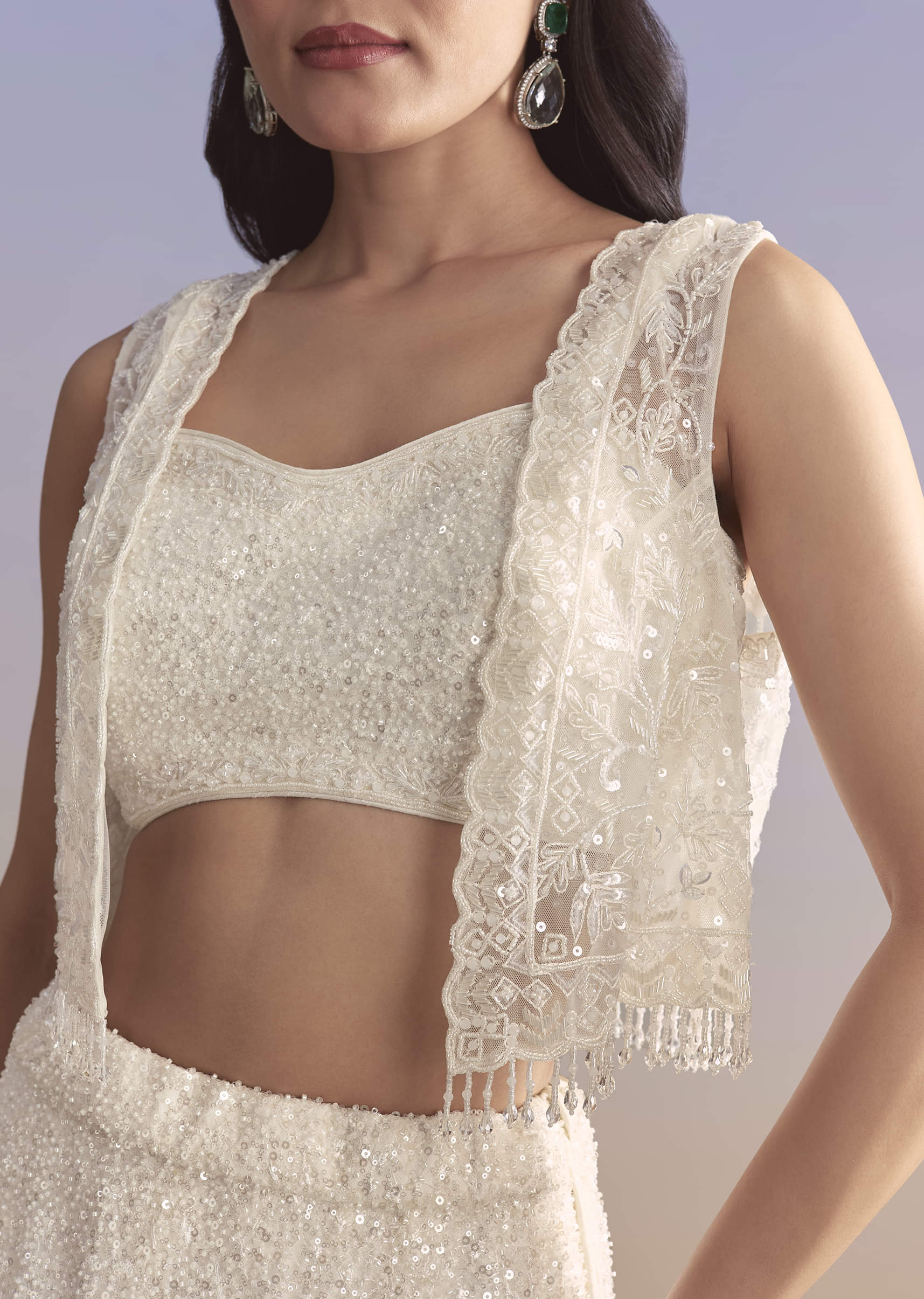 White Net Bridesmaid Lehenga With Sequins Work And Embellished Jacket - Image 3